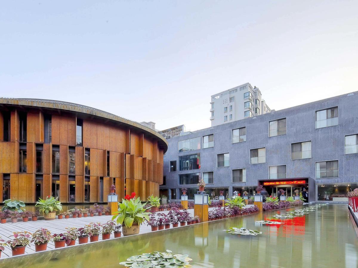 China Community Art Habitat Hotel Циндао Экстерьер фото