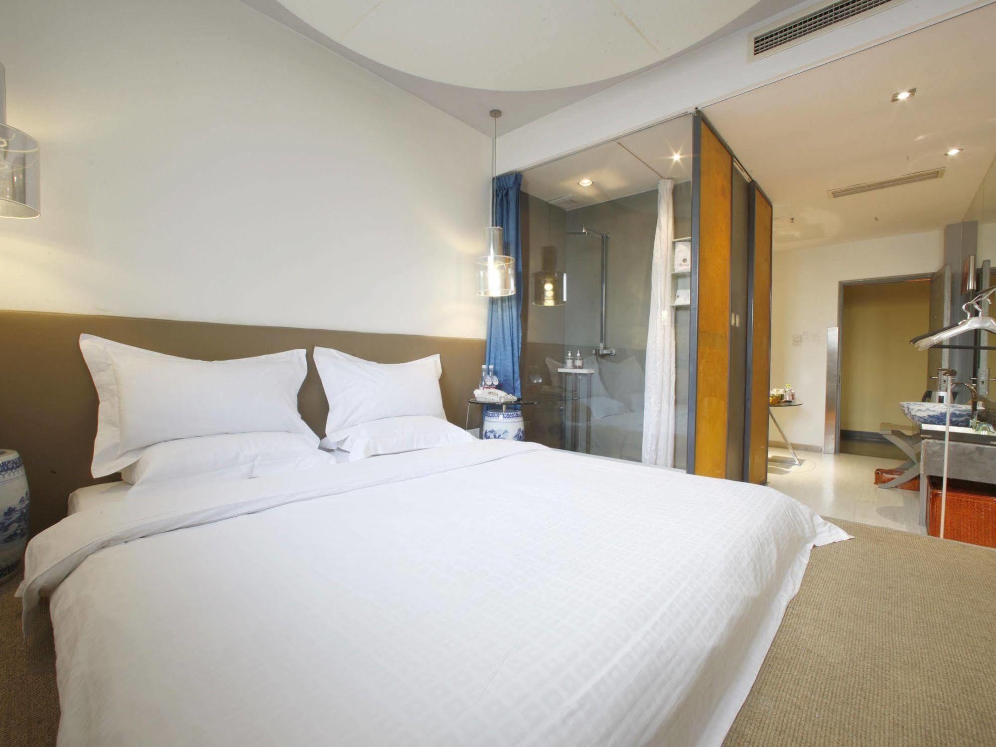 China Community Art Habitat Hotel Циндао Экстерьер фото
