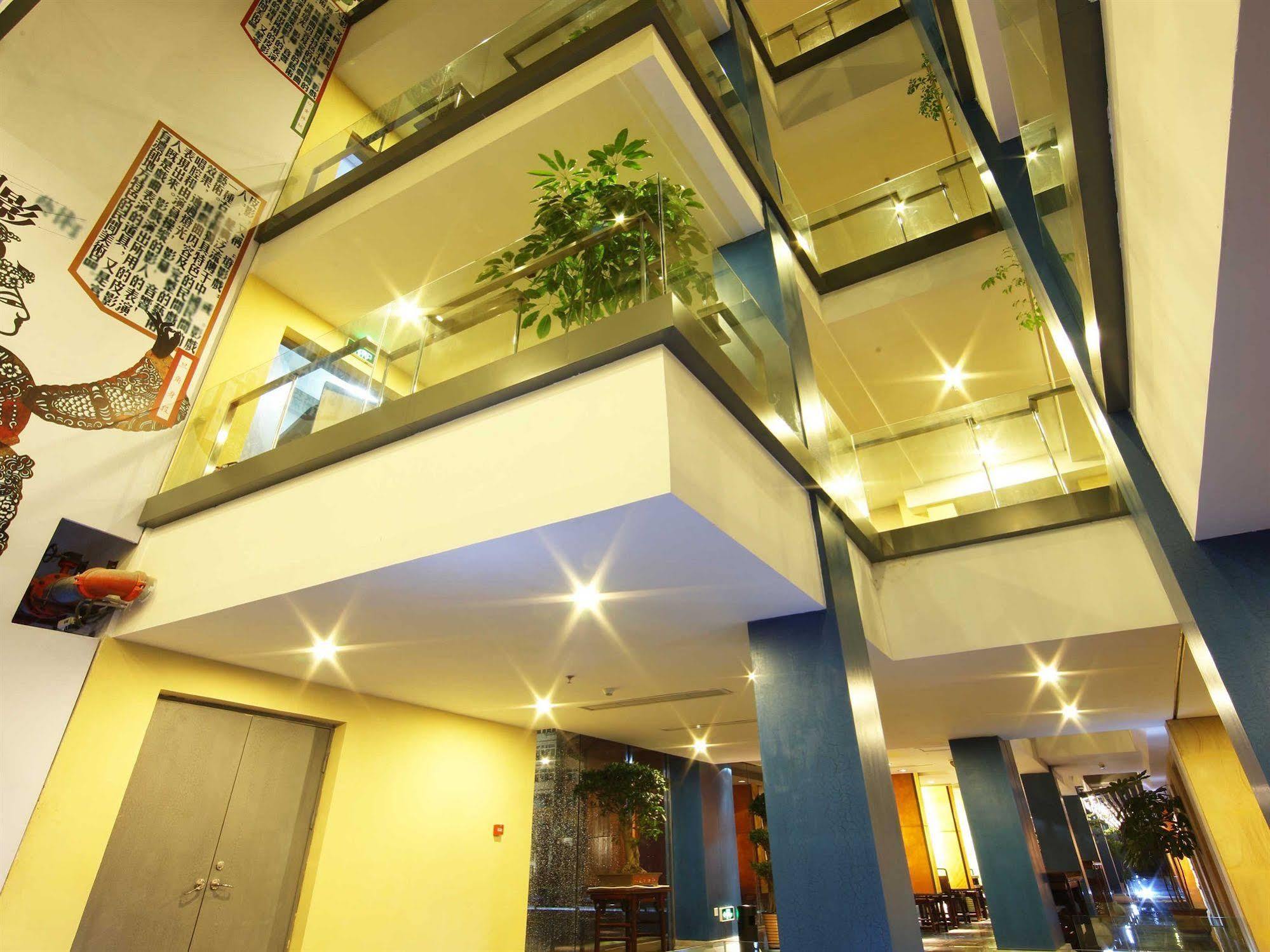 China Community Art Habitat Hotel Циндао Экстерьер фото
