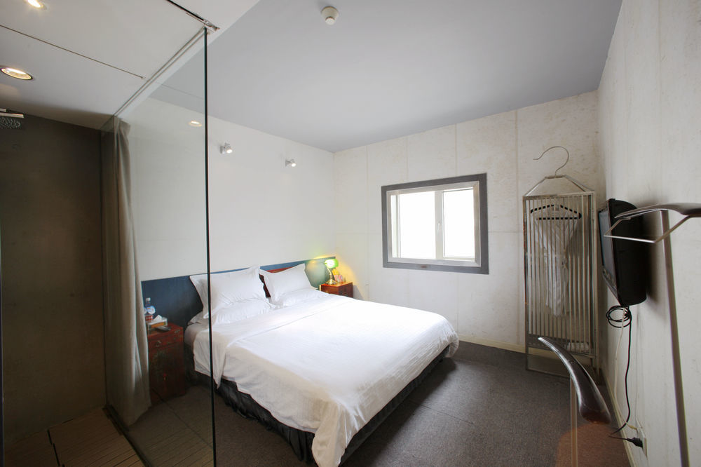 China Community Art Habitat Hotel Циндао Экстерьер фото