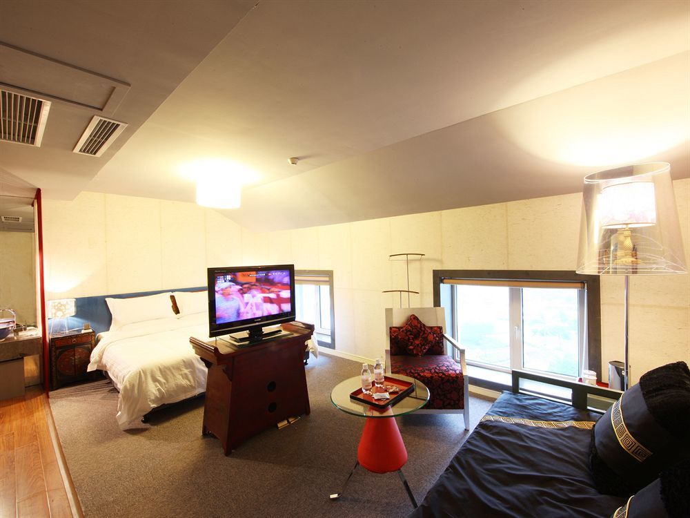 China Community Art Habitat Hotel Циндао Экстерьер фото