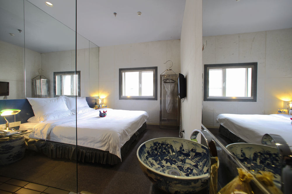 China Community Art Habitat Hotel Циндао Экстерьер фото